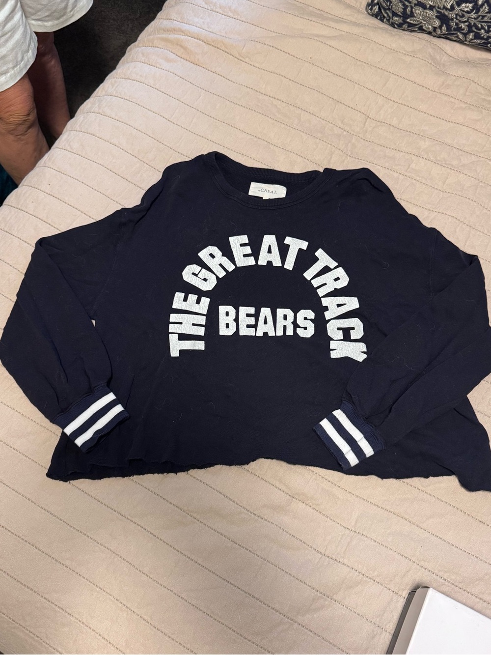 THE GREAT. Navy Crewneck Sweatshirt with White Track Graphic